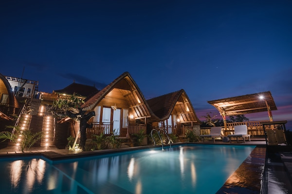 Outdoor pool, pool umbrellas, sun loungers