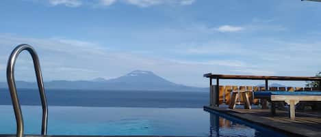 Outdoor pool, pool umbrellas, pool loungers