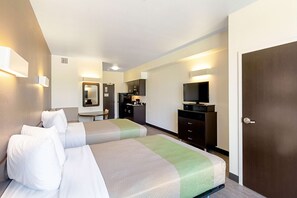 Espacio para trabajar con laptop, wifi gratis y ropa de cama 