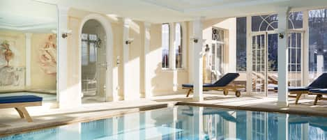 Indoor pool, seasonal outdoor pool, pool umbrellas, pool loungers