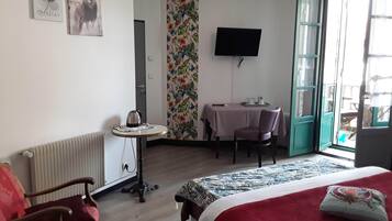 Family Double Room, Garden View | Individually decorated, desk, blackout drapes, free WiFi