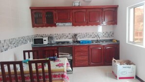 Apartment, 2 Bedrooms | Private kitchen | Espresso maker, coffee/tea maker, full-sized fridge, microwave - Appartement Bela Vista (São Vicente)