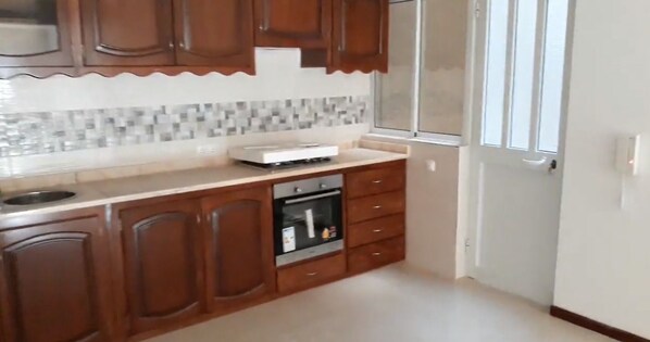 Apartment, 2 Bedrooms | Private kitchen | Full-size fridge, microwave, oven, stovetop
