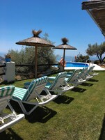 Outdoor pool, sun loungers