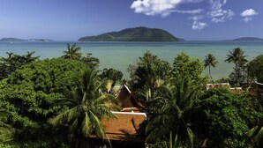 A tropical resort with a view of a small island, lush greenery, and a clear blue sky. - Amazing 5BR Seaview Private Pool Villa by Intira Villas (Rawai)