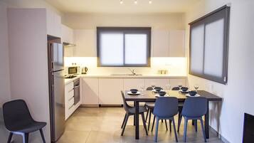Apartment | Private kitchen | Full-size fridge, microwave, oven, stovetop