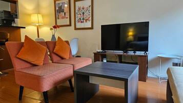 Apartamento standard | Área de estar | Smart TV, Netflix