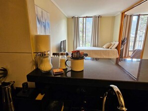 Departamento Confort, 1 habitación | Cocina privada | Refrigerador, microondas, horno y parrilla de estufa 