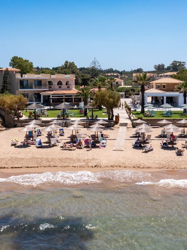 On the beach, sun-loungers, beach umbrellas, beach bar