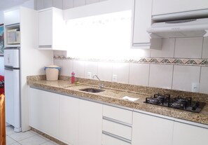 Family Apartment, Multiple Beds, Smoking, City View | Private kitchen | Fridge, microwave, oven, cookware/dishes/utensils