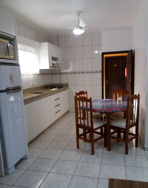 Family Apartment, Multiple Beds, Smoking, City View | Private kitchen | Fridge, microwave, oven, cookware/dishes/utensils