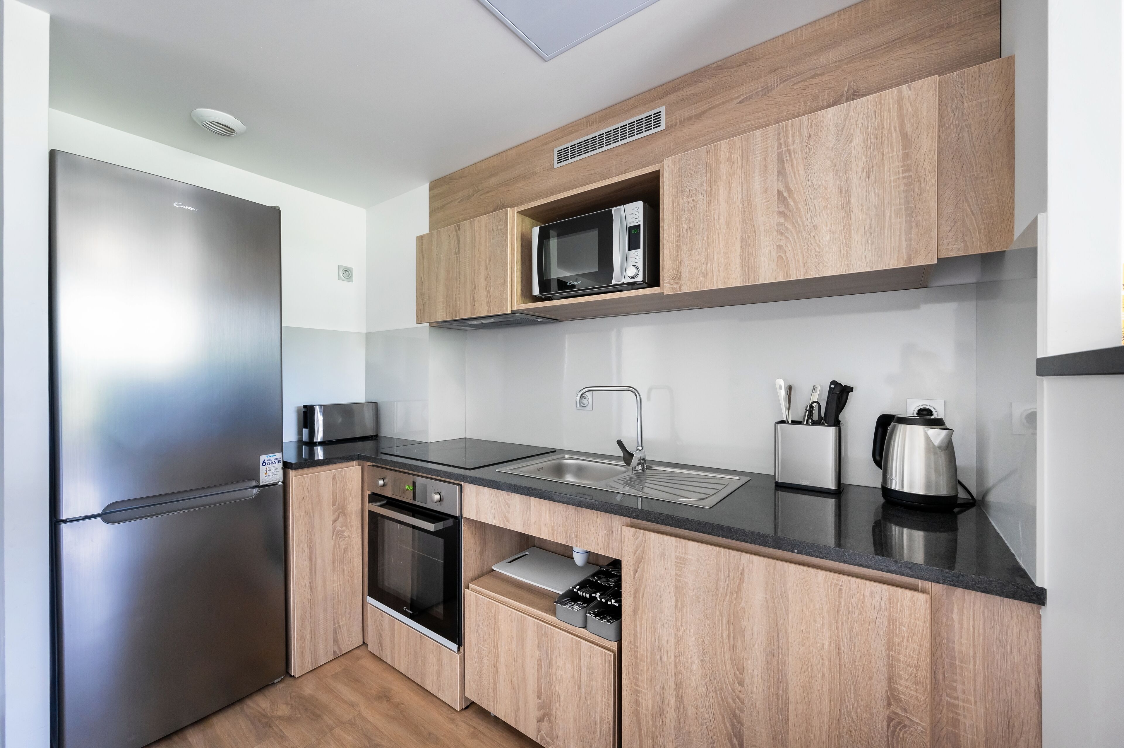 espresso maker, coffee/tea maker, electric kettle, high chair