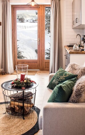 Luxury Apartment, Mountain View | Living area | Smart TV, heated floors