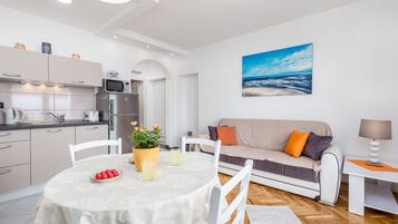 Exclusive Apartment, Sea View (Vista Bay Opatija 3) | Living area | Flat-screen TV