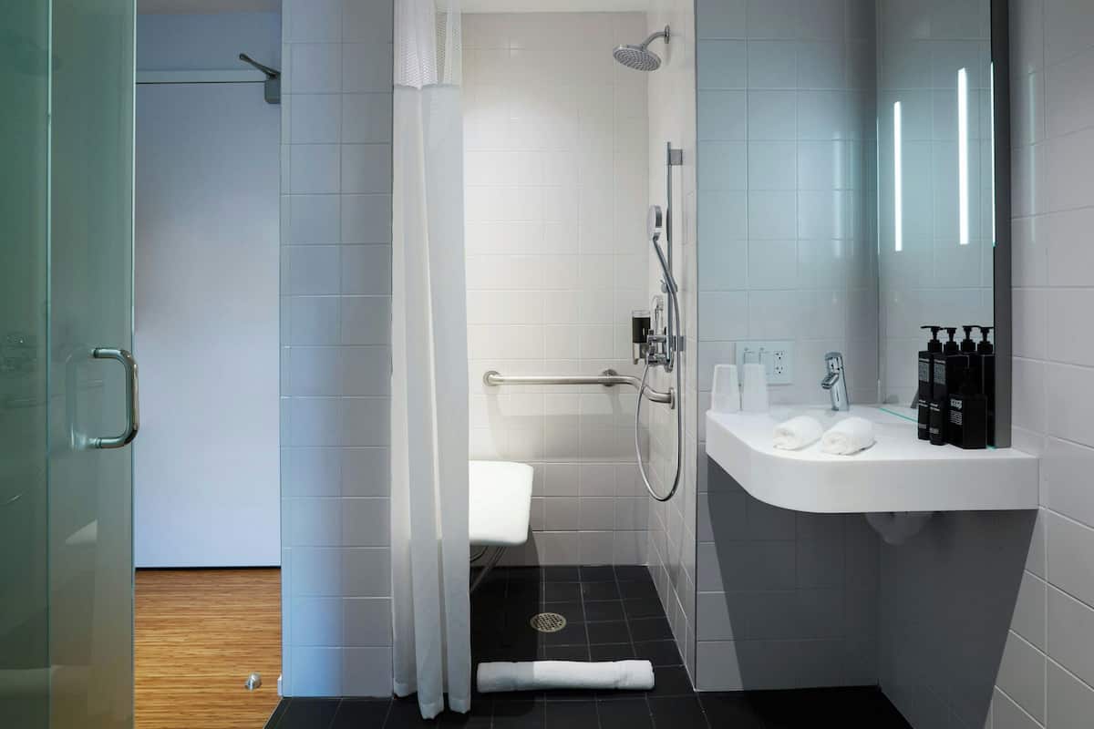 Room, 1 King Bed (Mobility Accessible, Roll-In Shower) | Premium bedding, pillow-top beds, in-room safe, desk