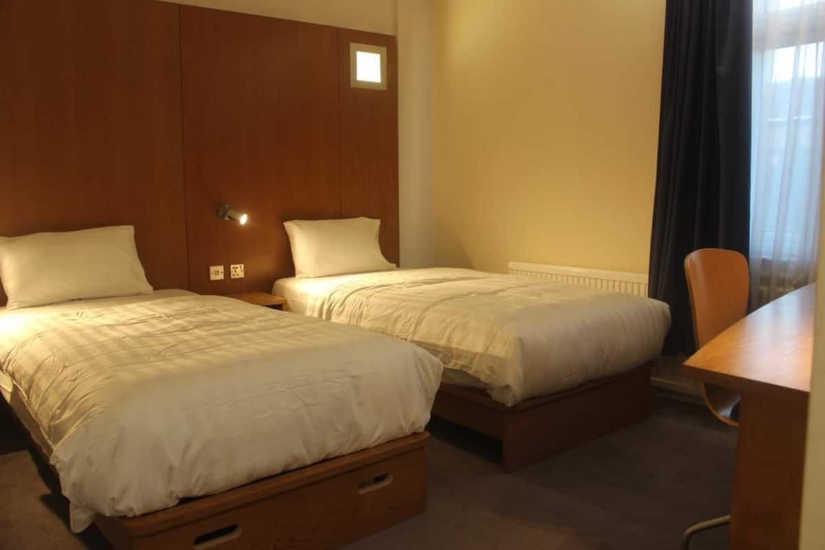 Individually decorated, individually furnished, desk, blackout curtains