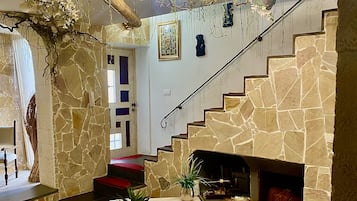 Suite, alberca privada | Área de sala de estar