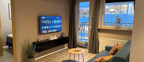 LĂ€genhet Comfort | Vardagsrum | Platt-tv