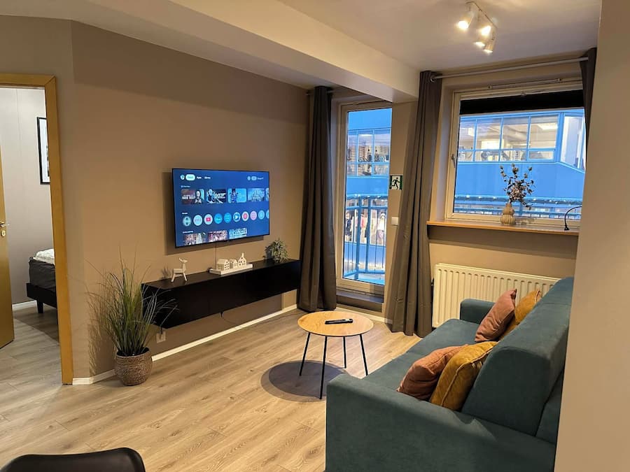 Comfort Apartment | Living area | Flat-screen TV