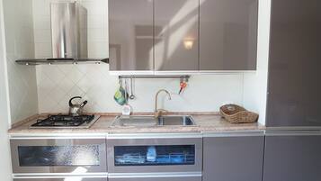 Villa | Cucina privata | Frigorifero, forno, piano cottura, pentole/stoviglie/utensili