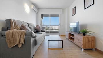 Apartment, 2 Bedrooms (6 pax) | Living area | Flat-screen TV