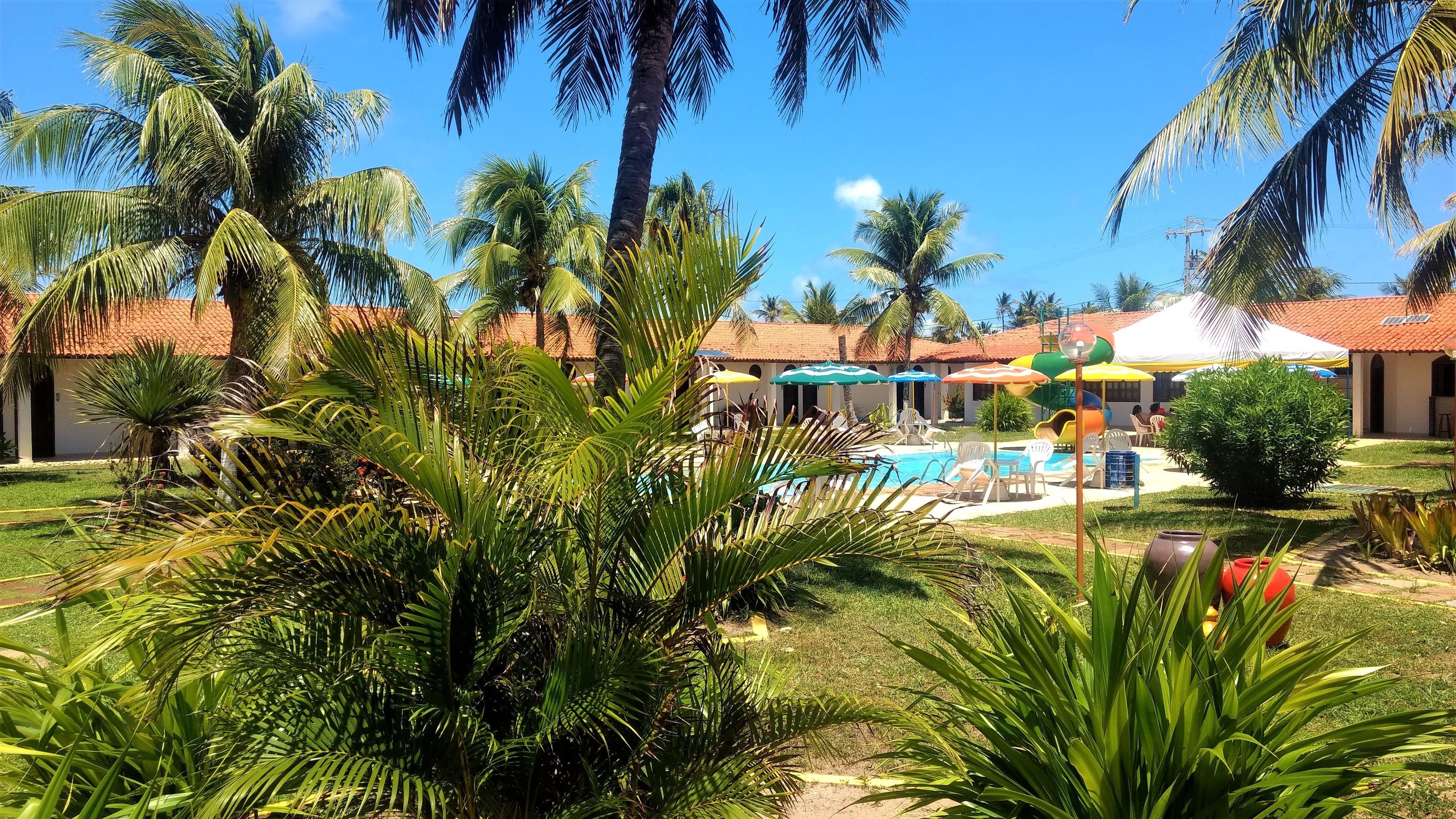 Indoor pool, outdoor pool, pool umbrellas, pool loungers