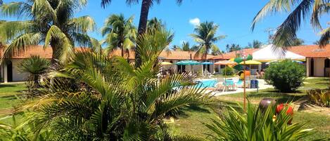 Indoor pool, outdoor pool, pool umbrellas, sun loungers