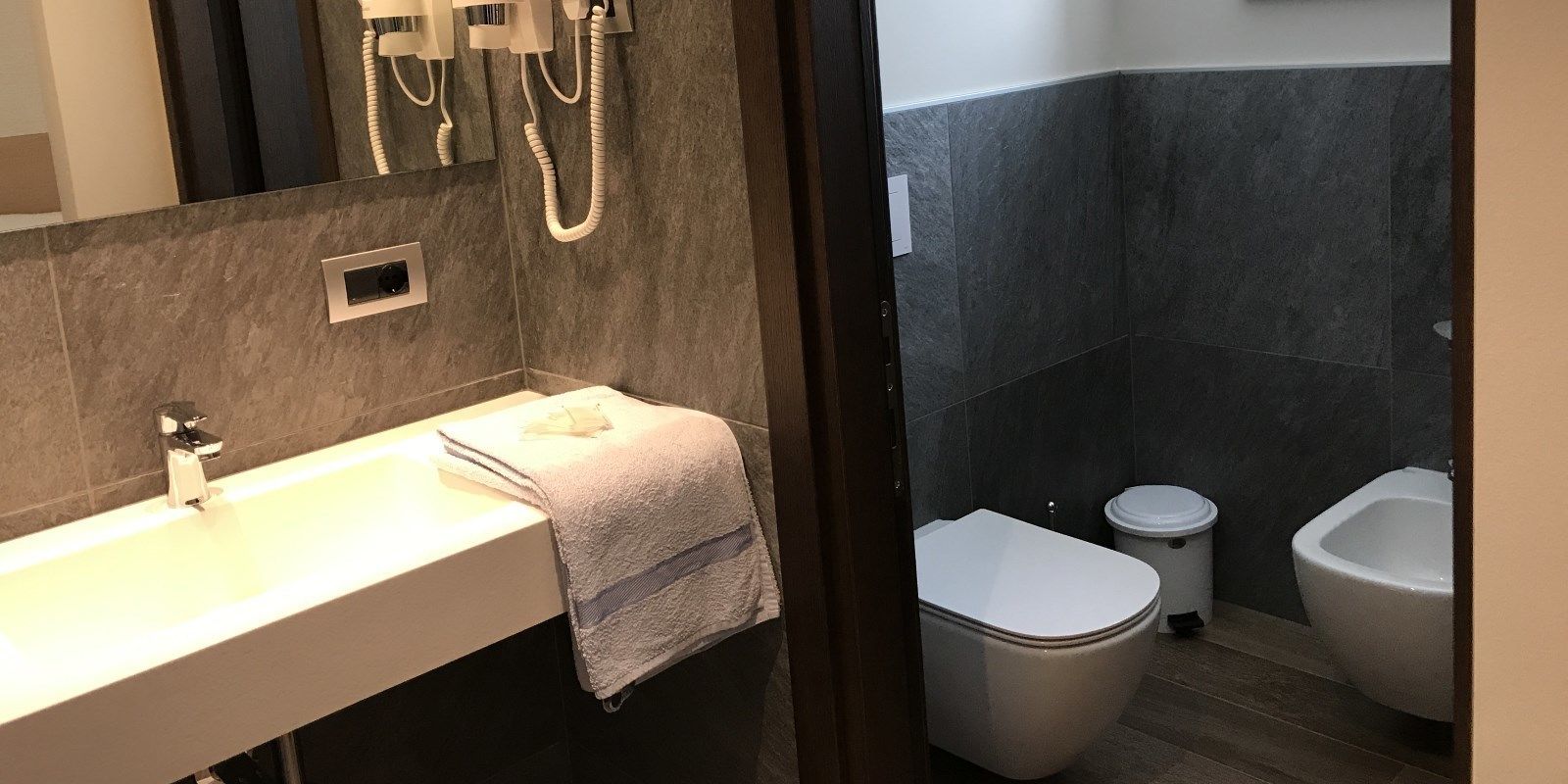 superior quadruple room | bathroom | shower, free toiletries, hair dryer, bidet