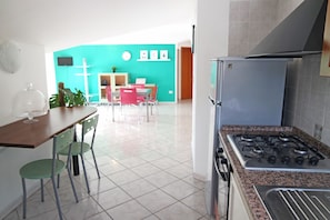 Apartment, 2 Bedrooms | Private kitchen | Fridge, oven, stovetop, cookware/dishes/utensils