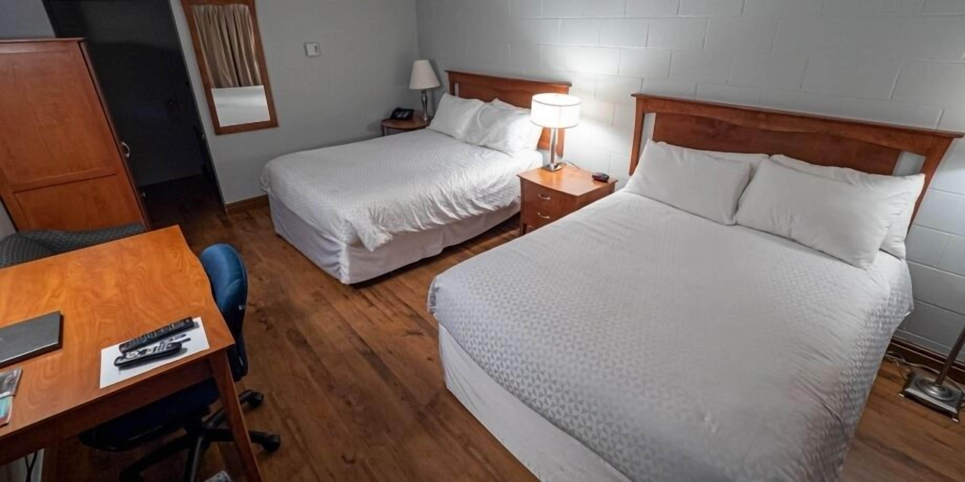 Economy Room, 2 Double Beds, Accessible, Non Smoking | 1 bedroom, desk, free WiFi, bed sheets