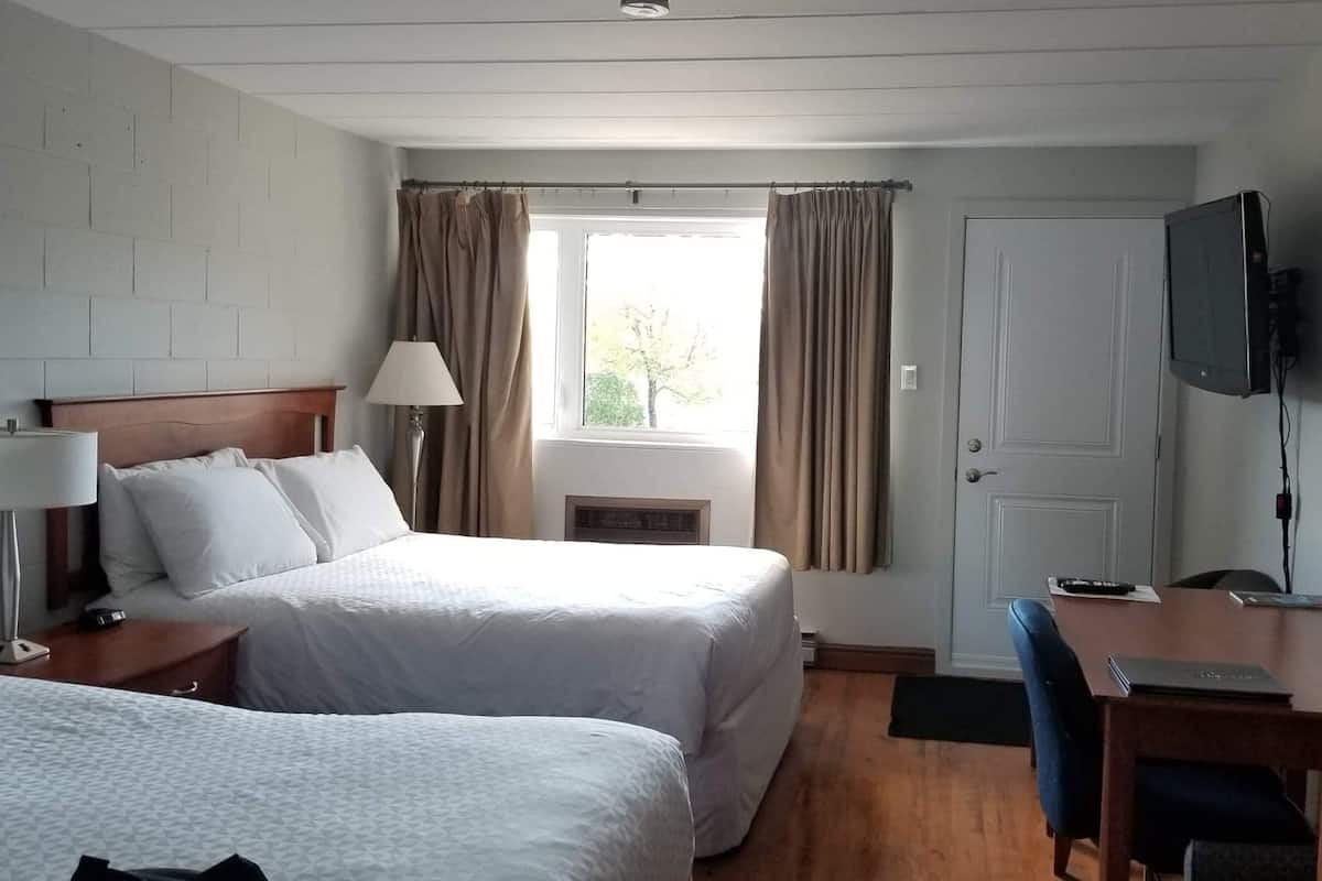 Economy Room, 2 Double Beds, Accessible, Non Smoking | 1 bedroom, desk, free WiFi, bed sheets