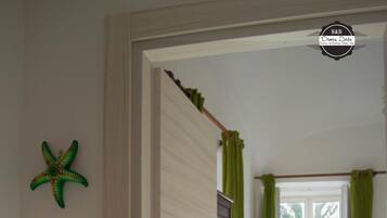 Desk, blackout drapes, soundproofing, free cribs/infant beds