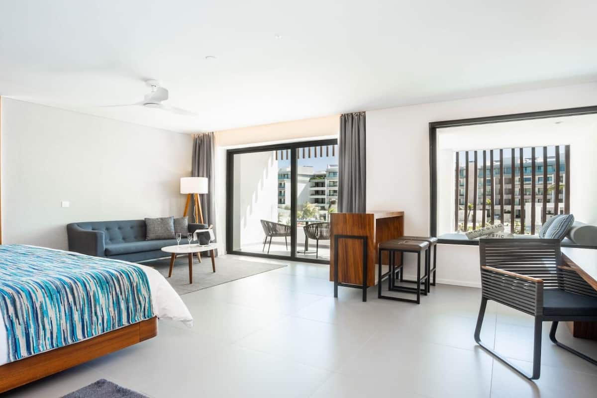 Pillow-top beds, free minibar, in-room safe, desk