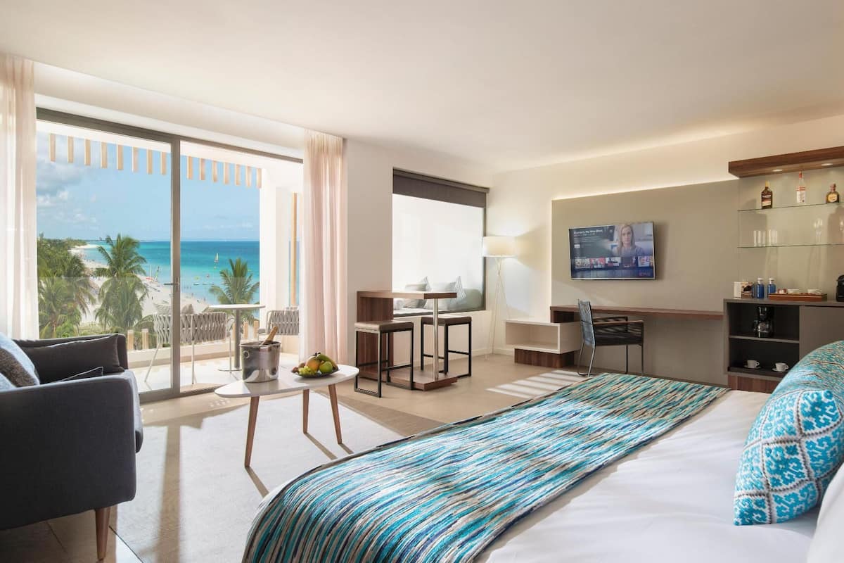 Pillow-top beds, free minibar, in-room safe, desk