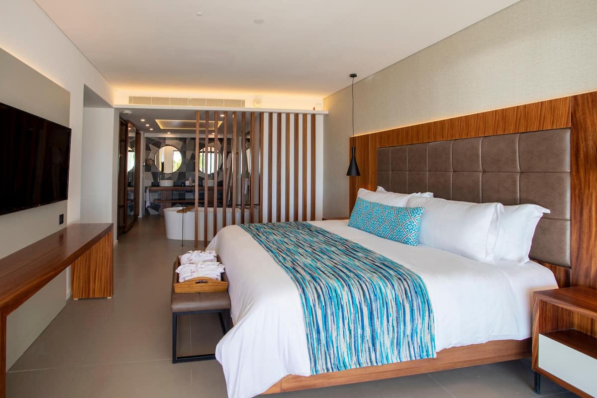 Pillow-top beds, free minibar, in-room safe, desk