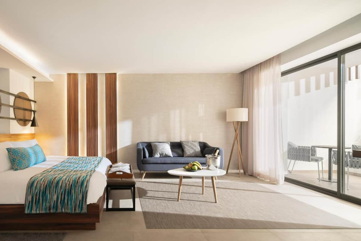 Pillow-top beds, free minibar, in-room safe, desk
