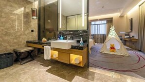 A modern bathroom with a large mirror, a vanity with a sink, and a teddy bear in a tent. - 3b Hotel (Yuyao Shengshan) (Yuyao)