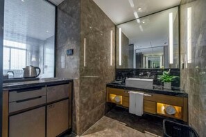 A modern bathroom with a large mirror, a sink, and a window. - 3b Hotel (Yuyao Shengshan) (Yuyao)