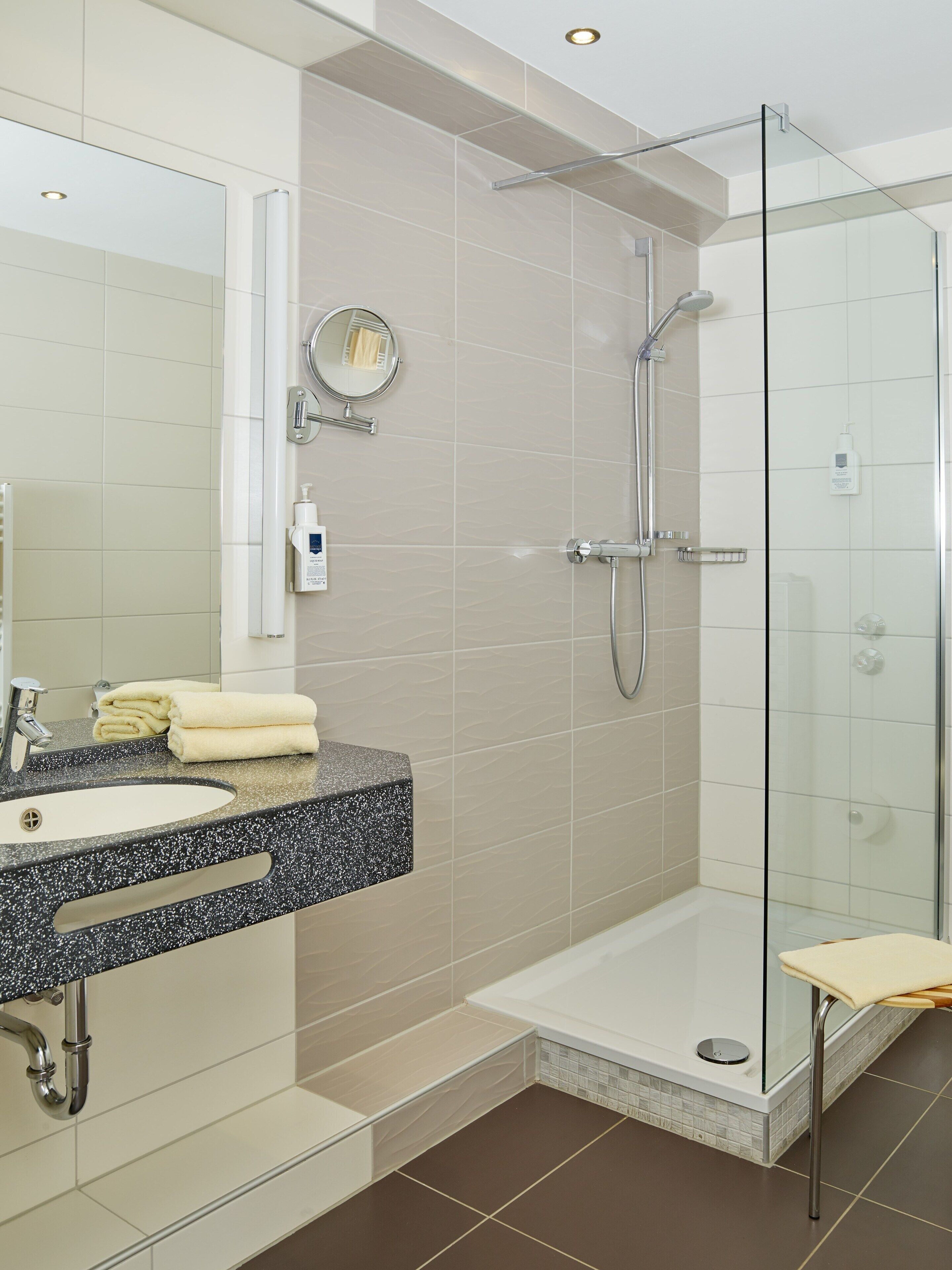 comfort double room | bathroom | hair dryer, towels, soap, shampoo