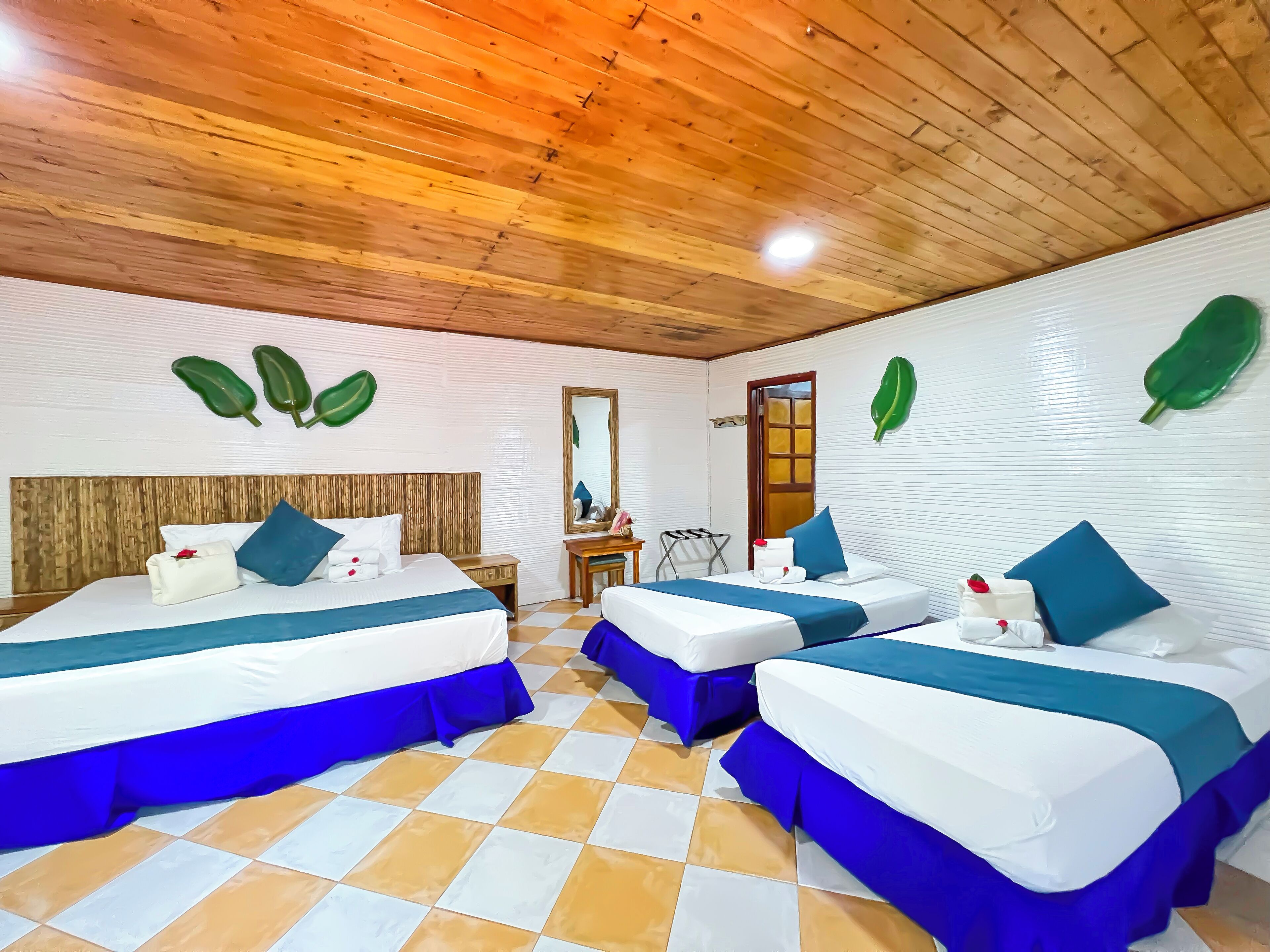 Standard Quadruple Room, 1 Bedroom, Garden View | Iron/ironing board, free WiFi, bed sheets