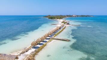 Playa privada, arena blanca, traslado desde/hacia la playa gratis