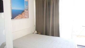 Quarto casal, terraço, vista para o mar | Escrivaninha, berços grátis, camas extras/dobráveis (sobretaxa)