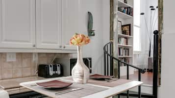 Deluxe Apartment, 1 Queen Bed with Sofa bed, Non Smoking, Garden View | Private kitchen | Fridge, microwave, stovetop, coffee/tea maker