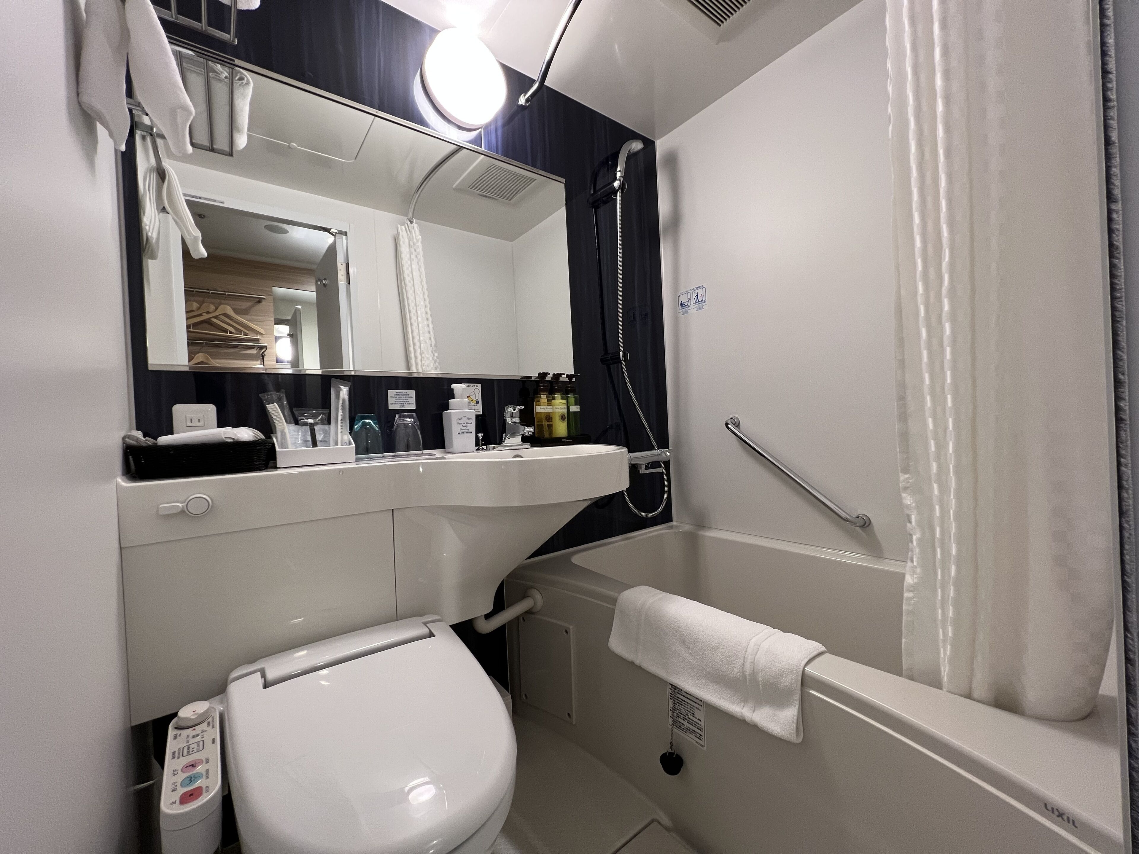 combined shower/bathtub, free toiletries, hair dryer, bathrobes