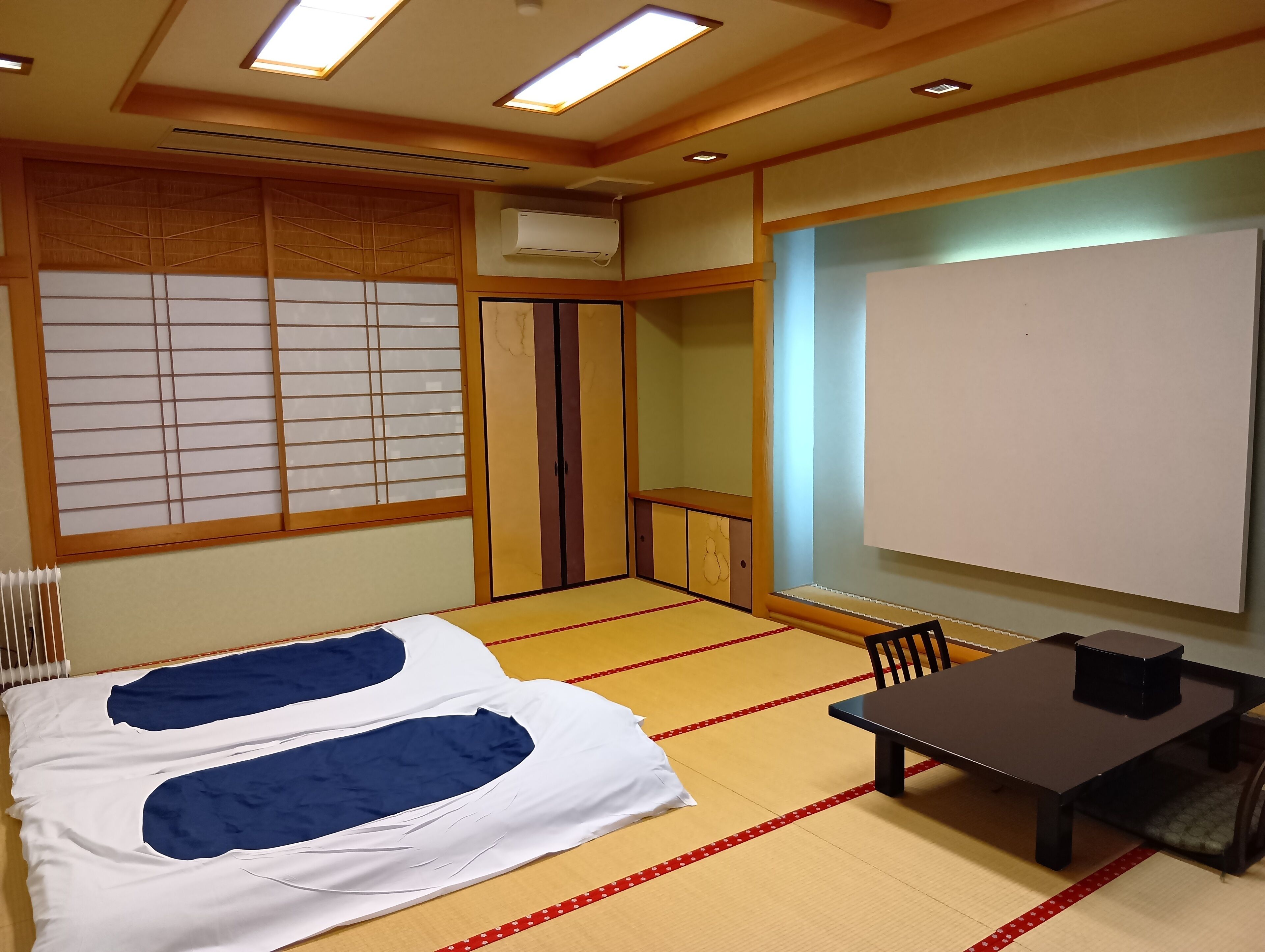 家庭房 (Japanese Style, with Shared Washroom) | 客房内保险箱、免费 WiFi、床单