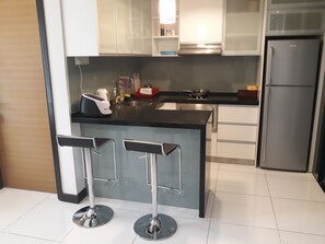 Standard 3 Bedroom | Private kitchenette | Full-size fridge, microwave, cookware/dishes/utensils - Sarang Vacation Apartment (Kuala Lumpur)