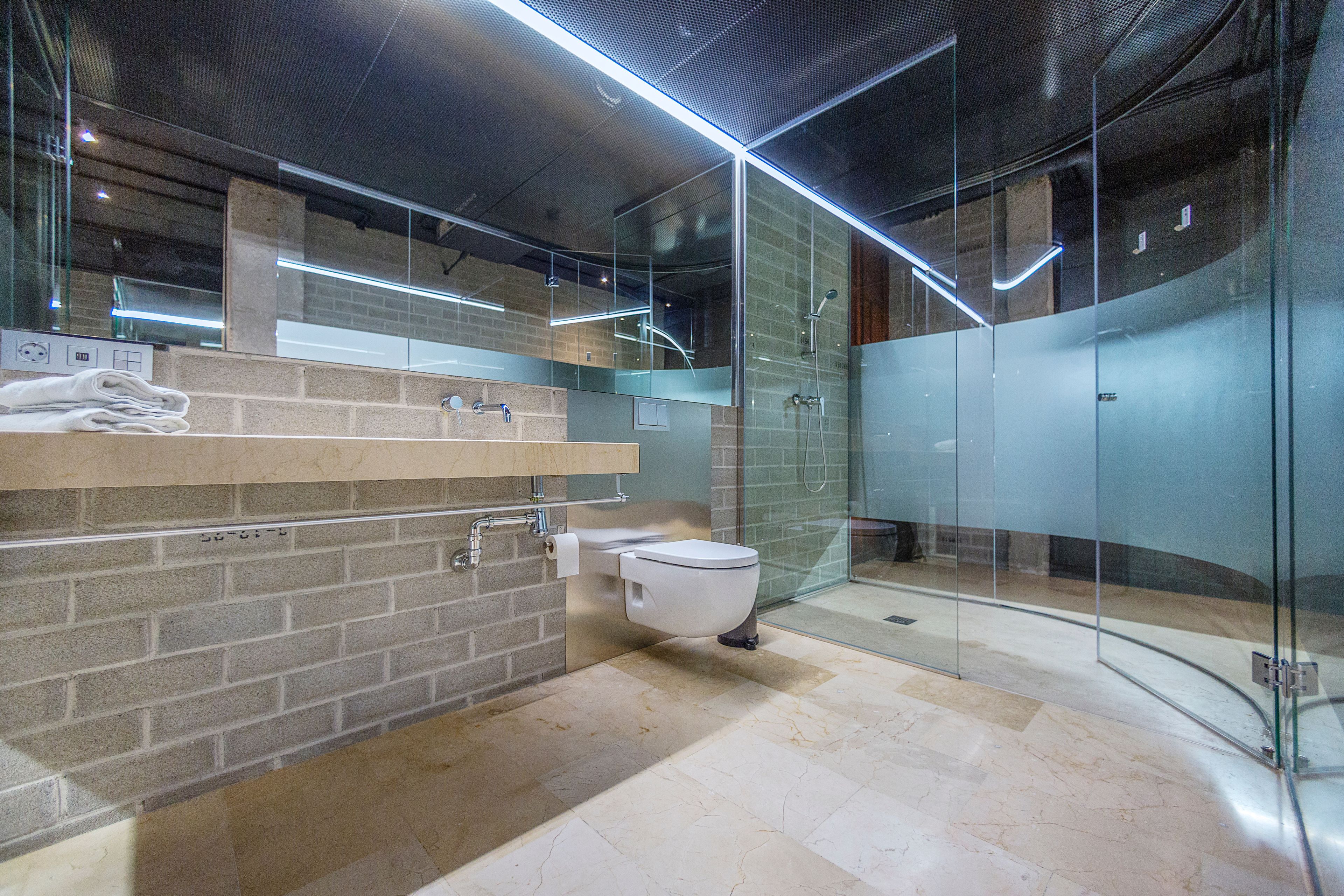 design studio suite, 1 queen bed with sofa bed, city view | bathroom | shower, free toiletries, hair dryer, slippers