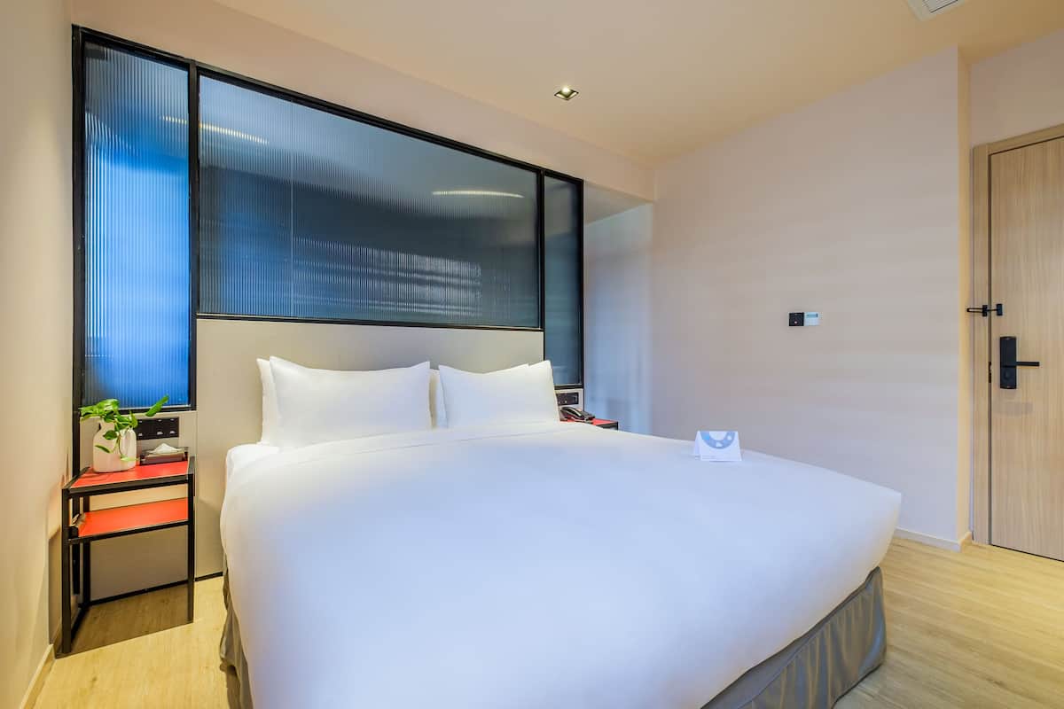 Standard Double Room | Minibar, in-room safe, desk, blackout curtains
