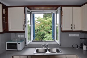 Villa, 5 Bedrooms, Partial Sea View | Private kitchen | Full-size fridge, microwave, oven, stovetop - Villa Kyma (Spetses)