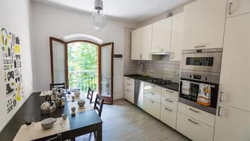 Apartment, 2 Bedrooms | Private kitchen | Full-size fridge, microwave, oven, stovetop